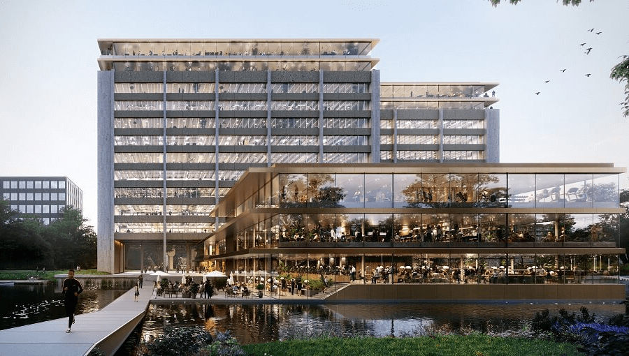 Modern kantoorgebouw Rembrandt Park One in Amsterdam met glazen gevels, groen en een waterpartij, ontworpen voor een duurzame werkomgeving.
