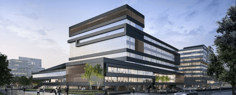 Fellenoord in Eindhoven, een duurzaam herontwikkeld kantoorgebouw met een transparante glasgevel, atrium en energie-efficiënte installaties door Bosman.